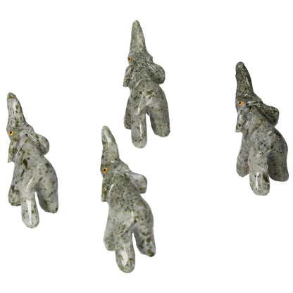 Carved Crystal Elephants in green dolomite showcasing intricate artistry and grounding energy from Sylvia Crystals.