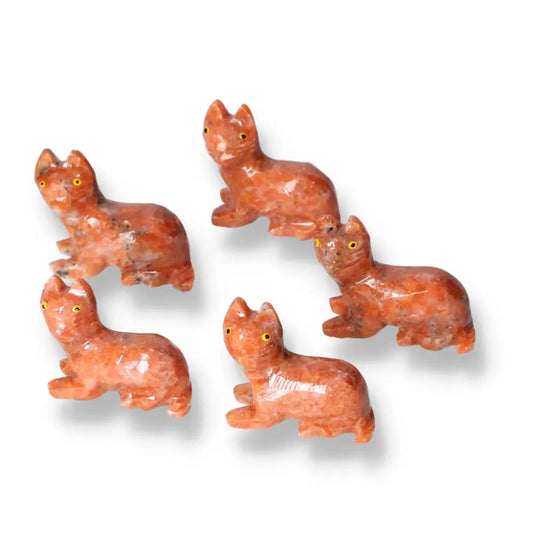 Five carved dolomite cat figurines showcasing exquisite artistry and natural beauty, promoting peace and emotional balance.