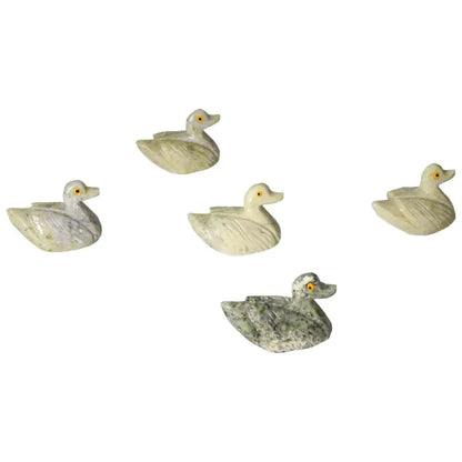 Handcrafted Carved Dolomite Duck figurines showcase elegance and tranquility, ideal for decor and emotional balance with calming properties.