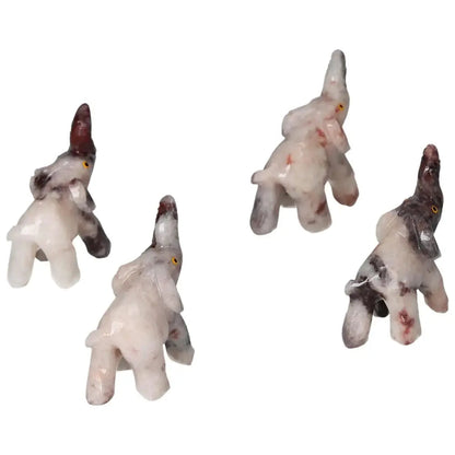 Carved Dolomite Elephants from Sylvia Crystals, showcasing premium craftsmanship and soothing elegance; perfect home decor.