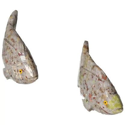 Carved Dolomite Fish sculptures from Sylvia Crystals, promoting tranquility and emotional balance, perfect for interior decor.