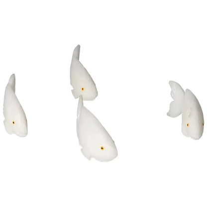 Carved Dolomite Fish by Sylvia Crystals showcasing exquisite handpicked artistry for emotional balance and grounding.