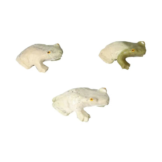 Three carved dolomite frogs from Sylvia Crystals, embodying nature's beauty and serenity with calming properties for emotional balance.