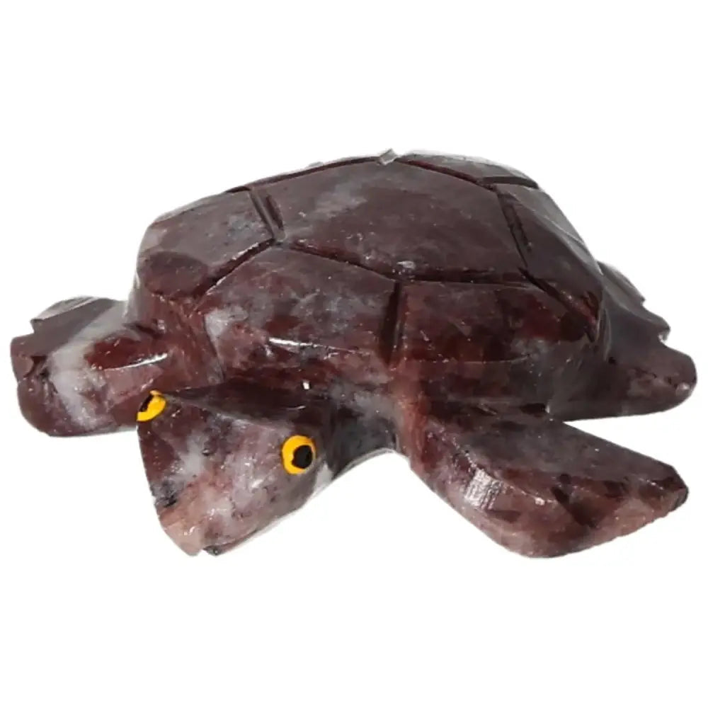 Carved Magnesite Turtle by Sylvia Crystals, showcasing natural elegance and spiritual growth properties in a premium crystal carving.
