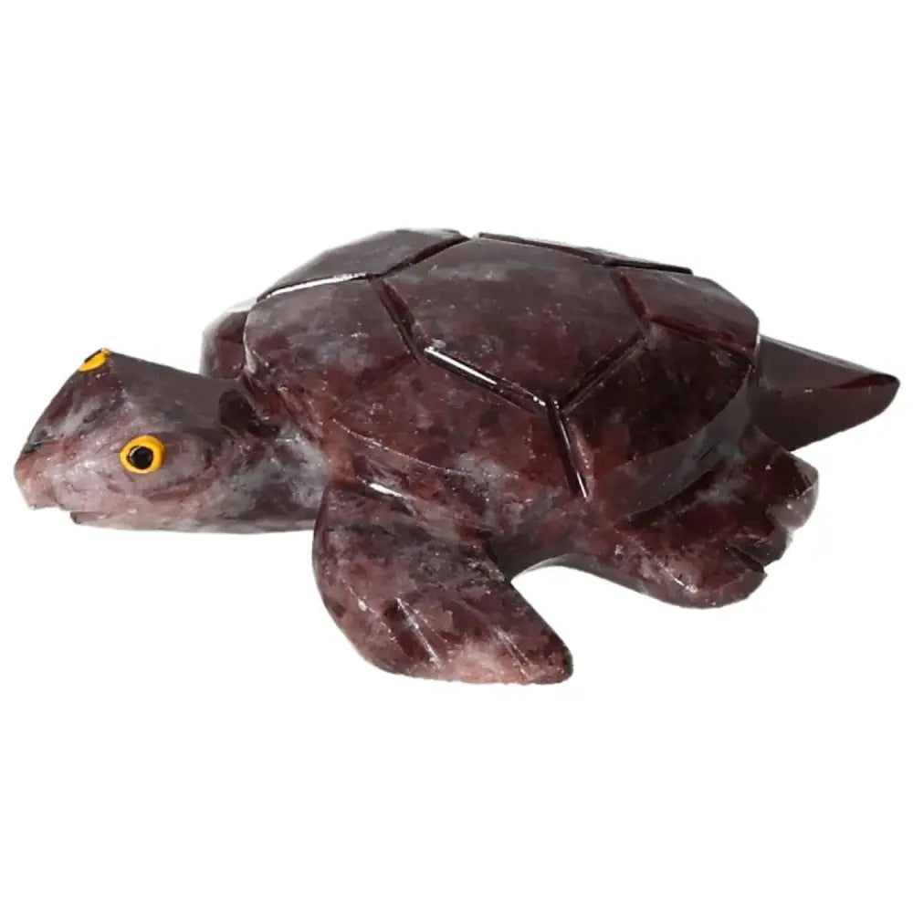 Exquisite carved magnesite turtle sculpture by Sylvia Crystals showcasing natural elegance and tranquility properties.