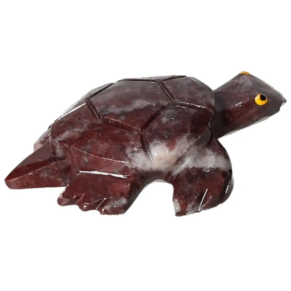 Carved Magnesite Turtle figurine from Sylvia Crystals, showcasing its natural elegance and metaphysical properties for spiritual growth.