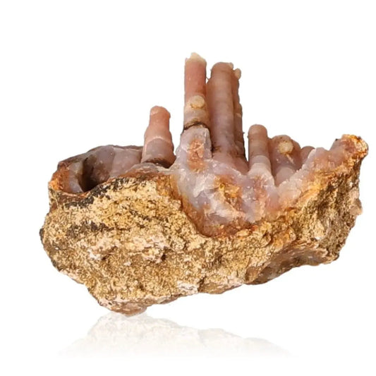 Chalcedony Stalactite from Sylvia Crystals, showcasing layered structures and ethereal hues. Handpicked for conscious luxury living.