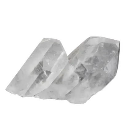 Clear Quartz Cluster with multiple crystal points, radiating clarity and amplifying energy, on a dark background.