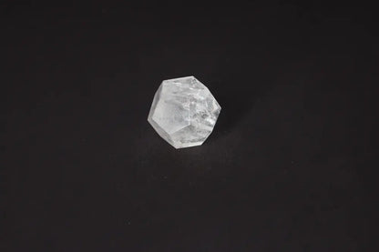 Clear Quartz Geometric Sphere 5 cm for purification and energy harmonization against a dark background