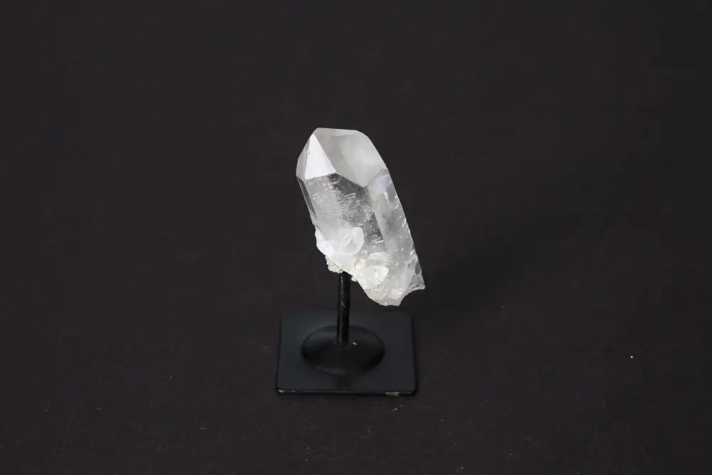 Clear Quartz On Metal Stand: Master Healer crystal amplifying energy, perfect for spiritual harmonization, from Sylvia Crystals.