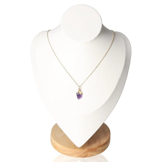Elegant amethyst crystal necklace from the 'Empath' set for enhancing intuition, displayed on a white mannequin stand.