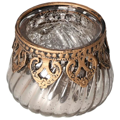 Sylvia Crystals Decorative Lantern with elegant gold trim, adding a touch of luxury and tranquility to any living space.