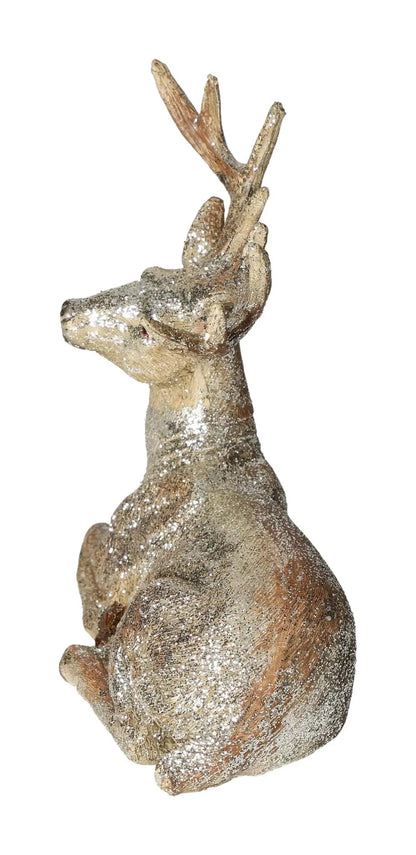 Deer figurine with glitter, champagne color, made of poly material, from Sylvia Crystals collection, elegantly seated.