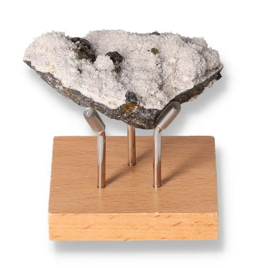 Galena stone on display stand, showcasing its mystical allure and transformative properties for spiritual protection and grounding.