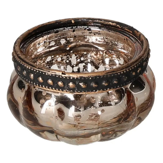 Elegant gold candle holder with a decorative black rim, reflecting luxurious craftsmanship and spiritual harmony.