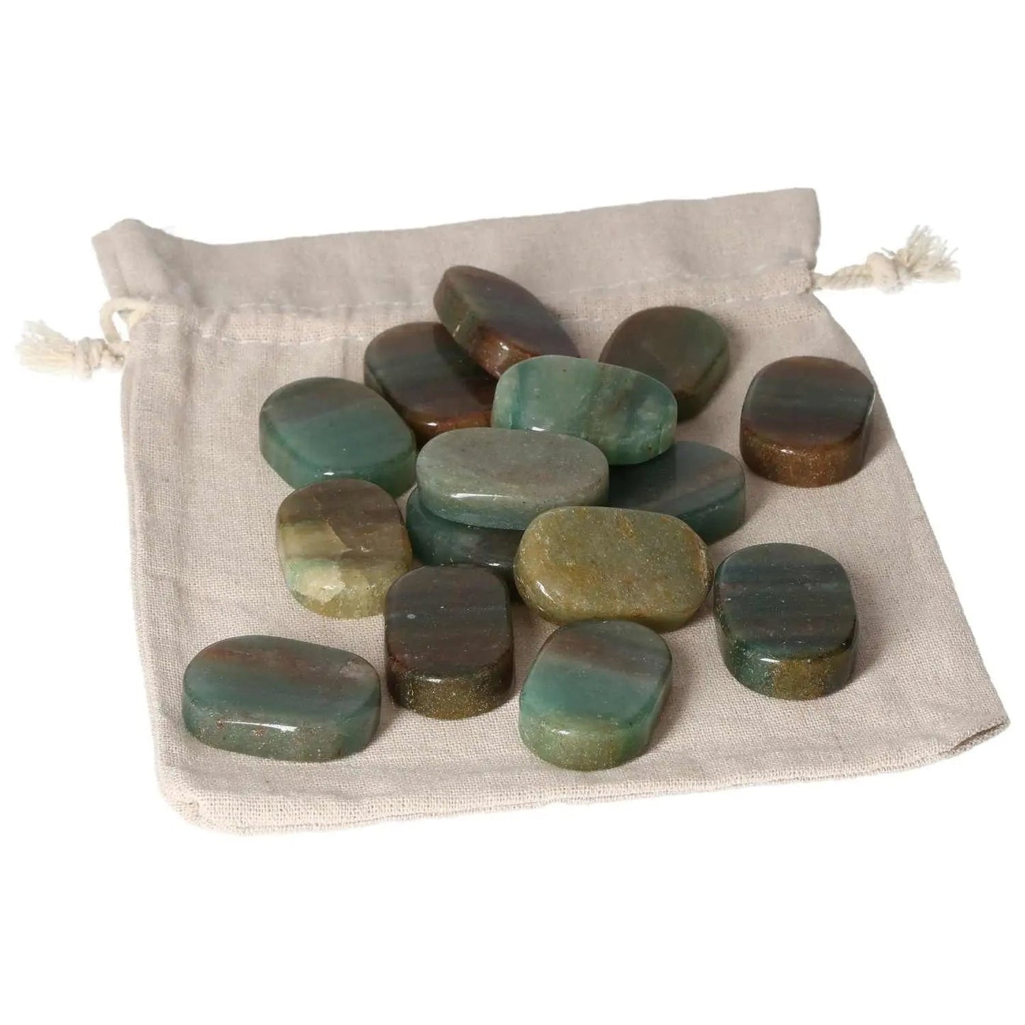 Set of green quartz with hematite antistress thumb massagers on a fabric pouch for relaxation and spiritual wellness.