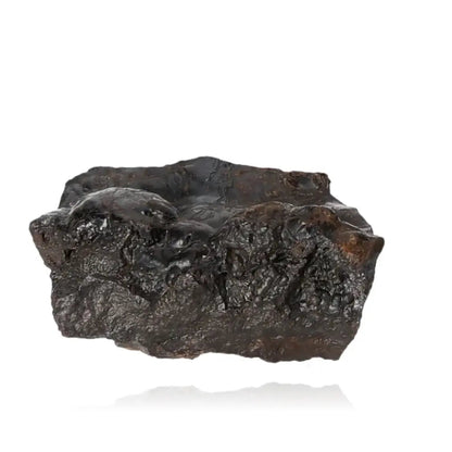Rough hematite stone with metallic sheen, symbolizing strength and energy activation for personal empowerment.