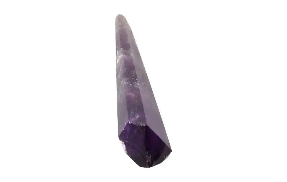 Amethyst point crystal for calm, clarity, and spiritual protection, with rich purple hues and natural clarity.