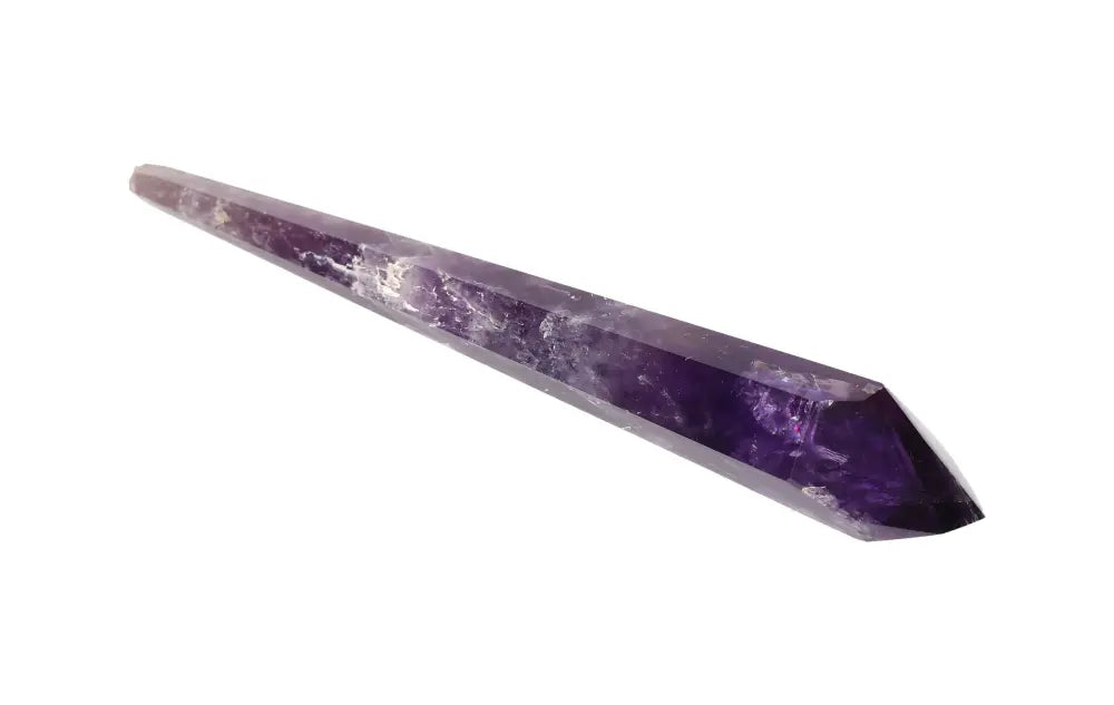 Amethyst point crystal for peace, intuition, and spiritual protection; ideal for meditation, energy healing, or altar work.