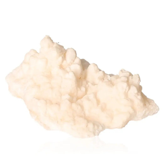 Ighoud Calcite Druze from Morocco, featuring natural shapes and warm earthy tones, symbolizing grounding and spiritual growth.