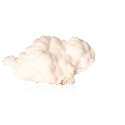 Ighoud Calcite Druze from Morocco showcasing natural shapes, warm earthy hues, and grounding energy for spiritual transformation.