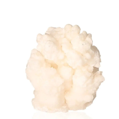 Ighoud Calcite Druze from Morocco, showcasing natural shapes and earthy tones, symbolizing grounding and spiritual growth.