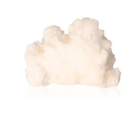 Ighoud Calcite Druze from Morocco showcasing its earthy tones and natural form, known for grounding and spiritual growth.