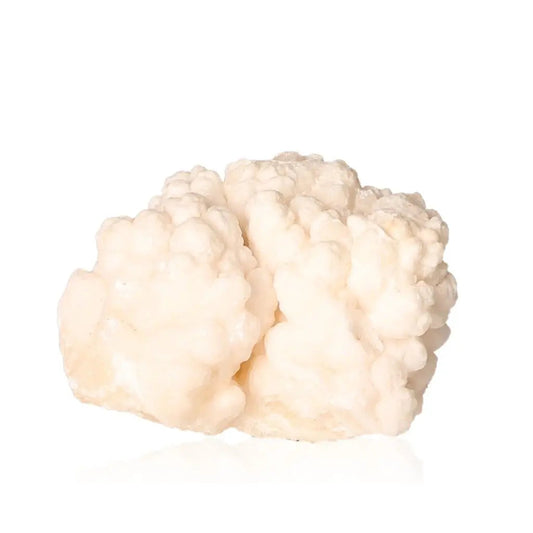 Ighoud Calcite Druze from Morocco, showcasing warm earthy tones and unique shapes, symbolizing grounding and transformation energy.