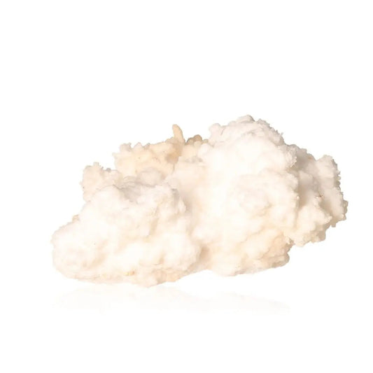 Ighoud Calcite Druze showcasing natural shapes and warm earthy tones, a mineral from Morocco symbolizing earth energy and stability.