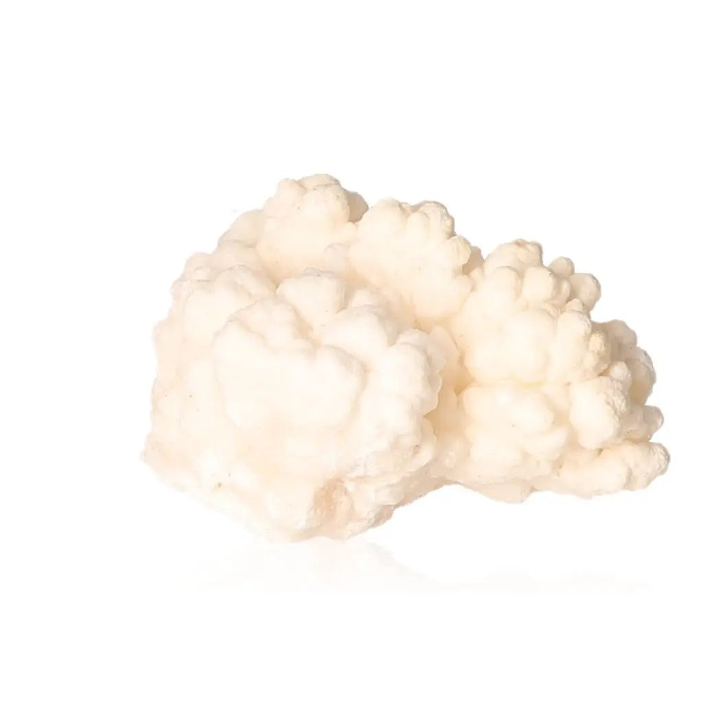 Ighoud Calcite Druze from Morocco, showcasing its unique natural shapes and earthy tones for grounding and transformation.