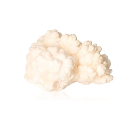 Ighoud Calcite Druze from Morocco, showcasing its unique natural shapes and earthy tones for grounding and transformation.