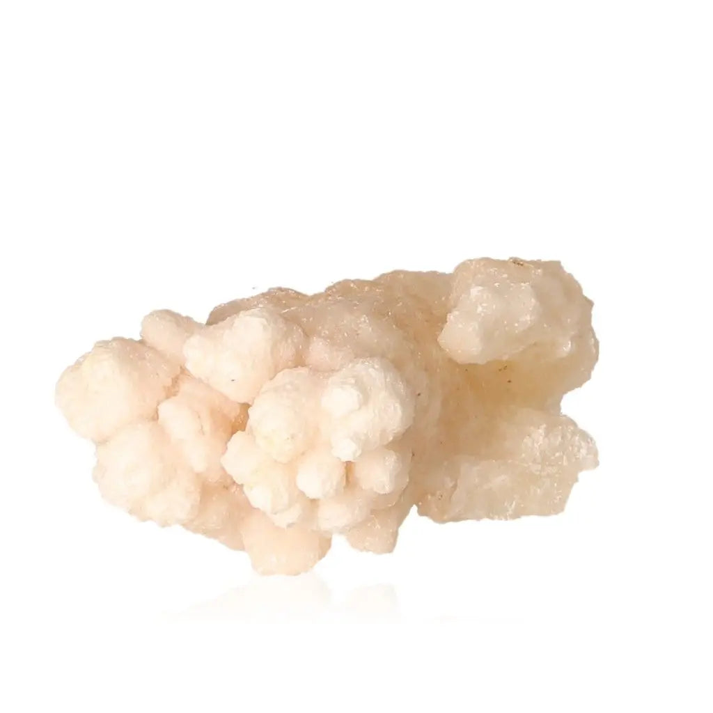 Ighoud Calcite Druze from Morocco in natural light, showcasing its unique formation and earthy tones, perfect for grounding and spiritual growth.