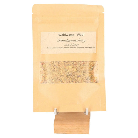 Incense Blend 'Lightness' in eco-friendly packaging, featuring a forest clearing scent with mandarin and damar resin.