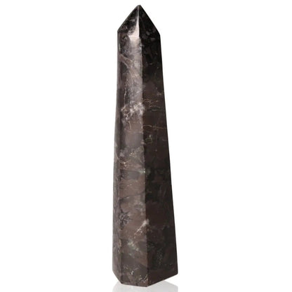 Indigo Gabbro Tower crystal with swirling black and indigo patterns, known as Mystic Merlinite for enhancing intuition and transformation.