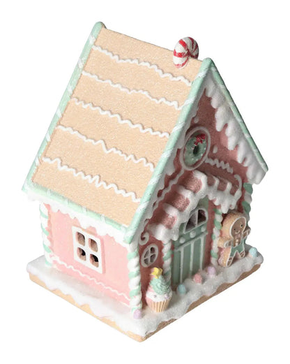 LED Light House Gingerbread made of Poly in pink, featuring intricate details and luxury craftsmanship by Sylvia Crystals.