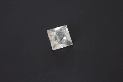 Lemurian Quartz Double Pyramid, 3.5 cm, showcasing sacred geometry with ancient wisdom on a dark background.