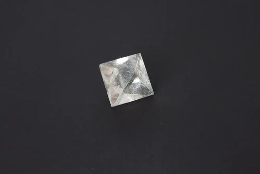 Lemurian Quartz Double Pyramid, 3.5 cm, showcasing sacred geometry with ancient wisdom on a dark background.