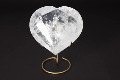 Lemurian Quartz Geometric Heart on a stand showcasing its crystal clarity and geometric design for spiritual connection and luxury.