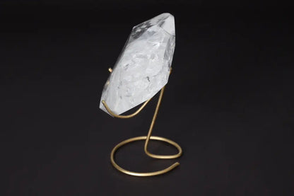 Elegant Lemurian Quartz Geometric Heart displayed on a gold stand, showcasing its clarity and unique geometry.