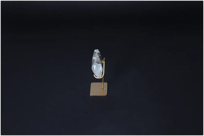Lemurian Quartz Geometric Heart on stand, showcasing its clear, purifying properties against a dark background for energy harmonization.