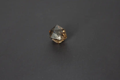 Lemurian Quartz geometric sphere on black background, showcasing sacred geometry and ancient wisdom attributes, 3.5 cm size.