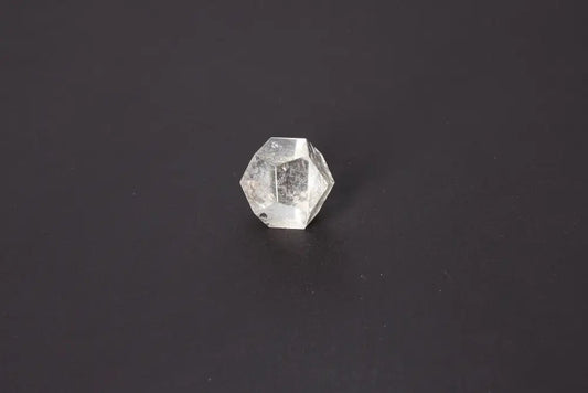 Lemurian Quartz Geometric Sphere 3.5 cm showcasing sacred geometry and ancient wisdom on a dark background.