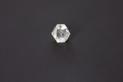 Lemurian Quartz Geometric Sphere 3.5cm displaying sacred geometry on a dark background, symbolizing spiritual awakening and intuition.