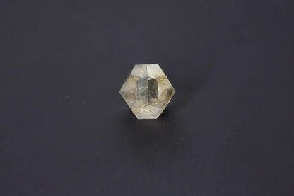 Lemurian Quartz geometric sphere with sacred geometry, showcasing ethereal clarity and ancient wisdom, on a dark background.