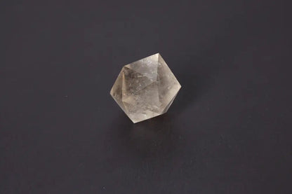 Lemurian Quartz Geometric Sphere displaying sacred geometry and spiritual connection on a dark background. Ideal for intuition awakening.
