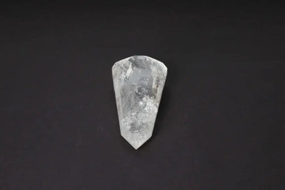 Lemurian Quartz Point crystal on black background showcasing horizontal striations symbolizing ancient wisdom from a mythical civilization.