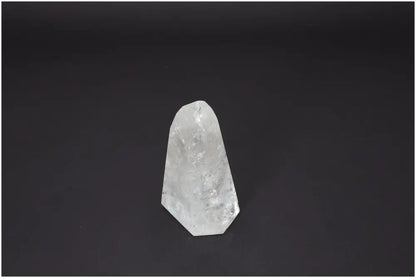 Lemurian Quartz Obelisk for chakra and zodiac energy alignment on dark background