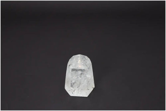 Lemurian Quartz Obelisk enhancing spiritual energy for chakra balancing and zodiac alignment on a dark background.