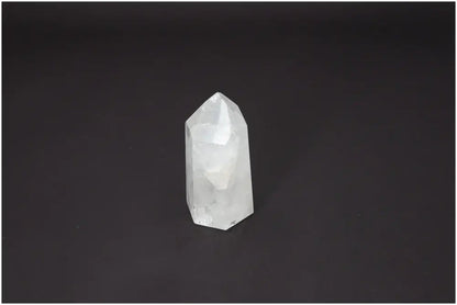 Lemurian Quartz Obelisk on black background, highlighting its unique properties for chakra and spiritual needs