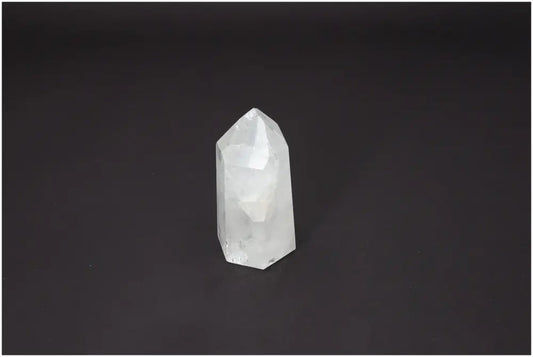 Lemurian Quartz Obelisk on black background, highlighting its unique properties for chakra and spiritual needs